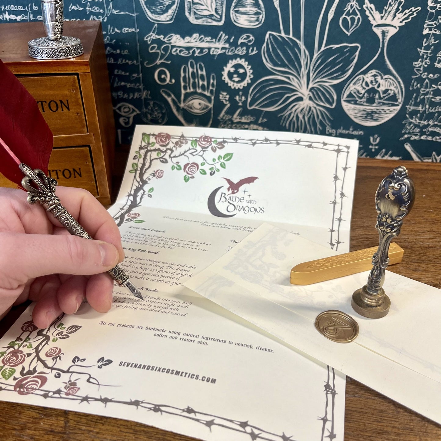 Fantasy dragon scroll with gold wax-sealed stamp, part of the dragon egg bath bomb gift set, styled like a mystical message from a dragon’s kingdom