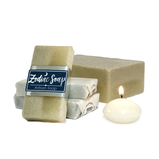 Zodiac-themed artisan handmade soap paired with a scented candle, styled for a luxurious self-care experience.