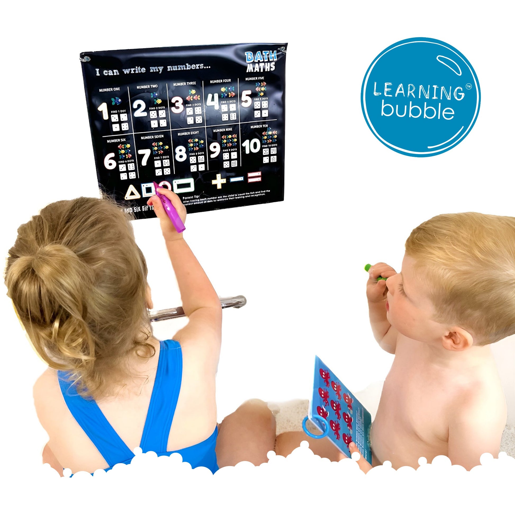 Children practicing numbers and simple sums using bath crayons and educational flashcards during interactive bath time learning.