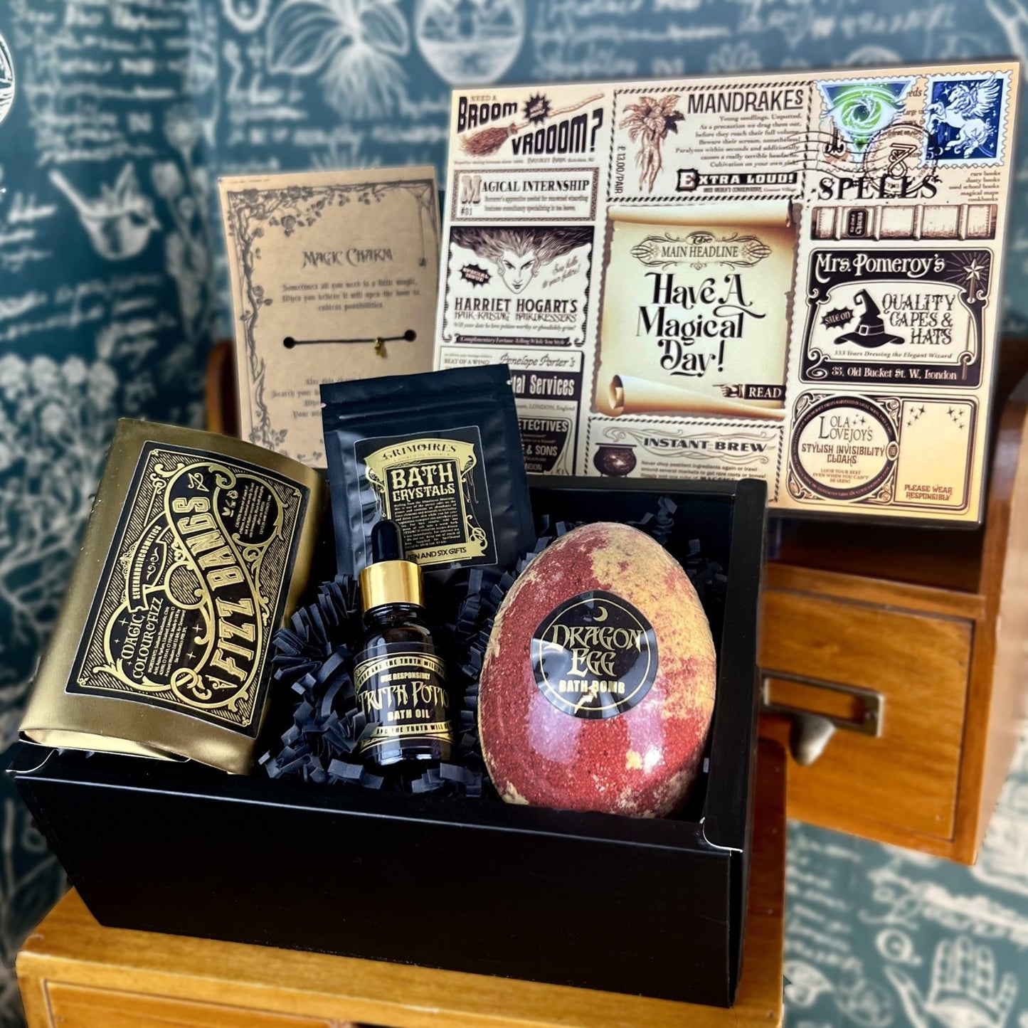 Dragon Egg Bath Bomb magical gift set displayed in a mystical shop, featuring a personalised magical newspaper gift box and enchanting magical items inside