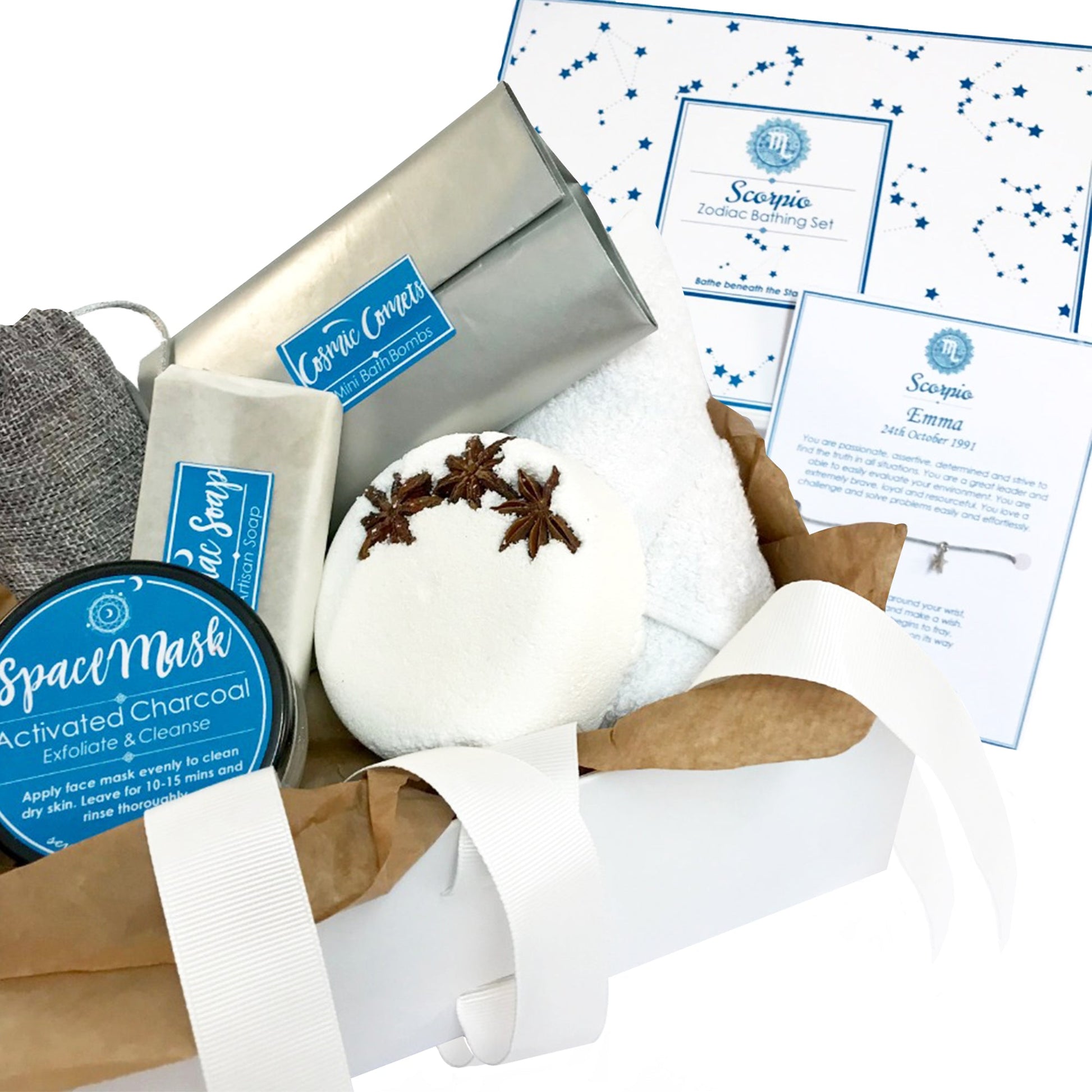 Star sign-themed zodiac spa gift set featuring handmade soap, bath fizzers, and cosmetic items, arranged for a luxurious at-home pampering experience