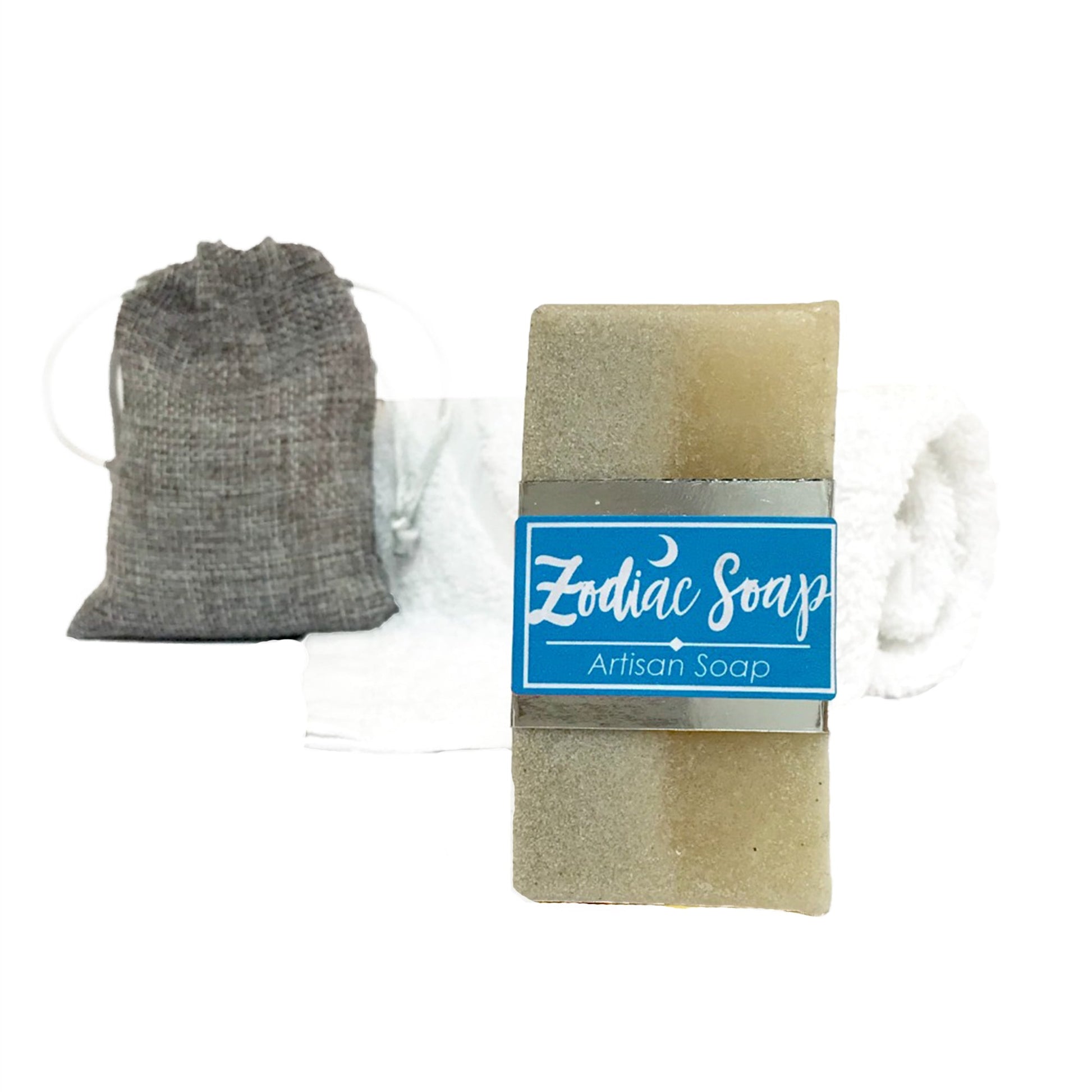 Zodiac-themed handmade artisan soap with a white towel and bath salts, styled for a luxurious at-home spa experience