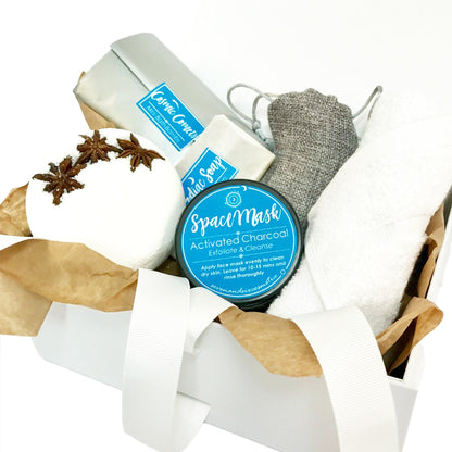 Zodiac horoscope gift set for a luxurious spa experience, featuring bath bombs, handmade soap, and pampering self-care items. 